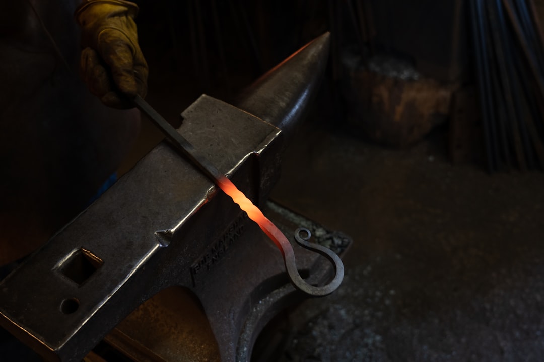 person-holding-black-and-silver-sword-uvmvzxynqug